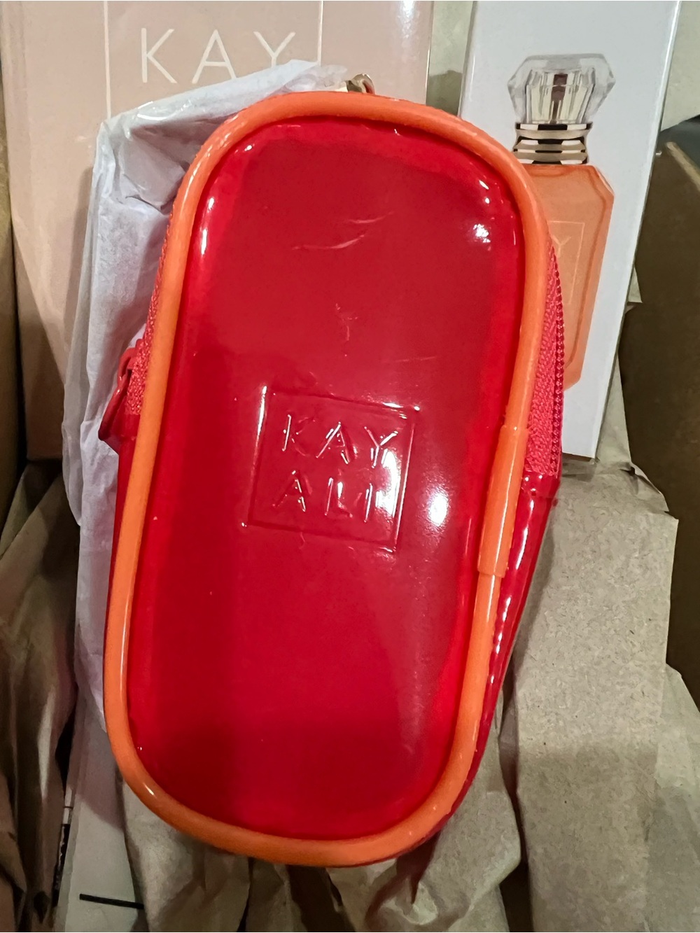 KAYALI Red and Orange Vinyl Cosmetic Pouch